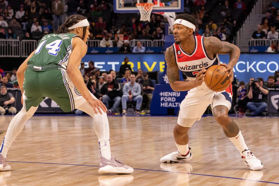 Detroit Pistons guard R.J. Hampton (14) defends against Washington Wizards guard Bradley Beal (3) in the first quarter at Little Caesars Arena in Detroit on Tuesday, March 7, 2023.