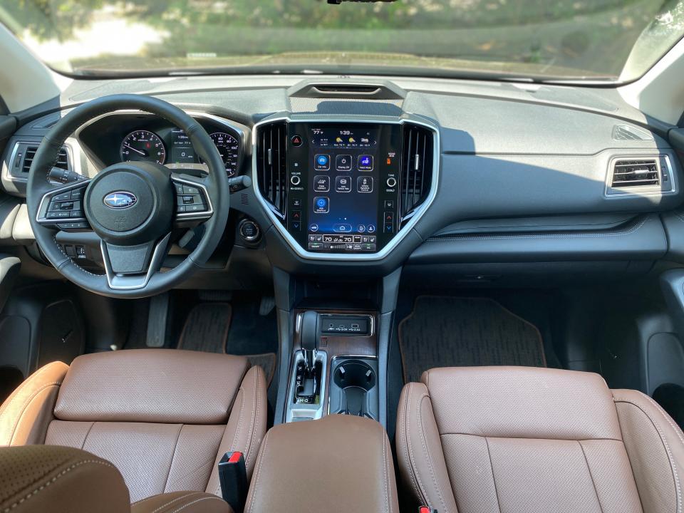 The 2024 Subaru Ascent's front dash features an 11.6-inch infotainment screen and is trimmed in black leather.