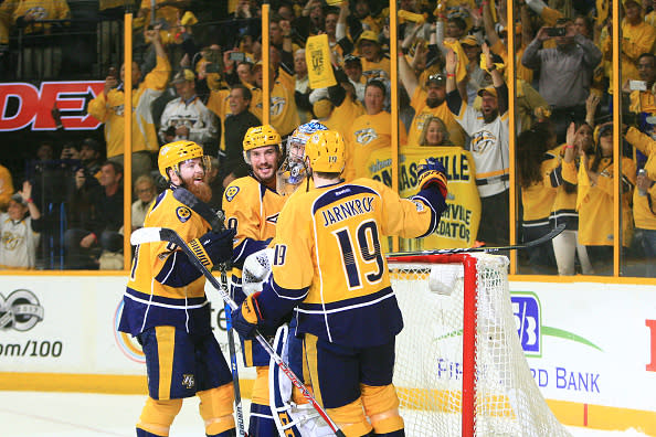 NASHVILLE, TN - MAY 07: Nashville Predators goalie Pekka Rinne (35) celebrates with center Calle Jarnkrok (19), defenseman Roman Josi (59) and defenseman Ryan Ellis (4) at the conclusion of Game Six of Round Two of the Stanley Cup Playoffs between the Nashville Predators and the St. Louis Blues, held on May 7, 2017, at Bridgestone Arena in Nashville, Tennessee. The Predators defeated the St. Louis Blues to advance to the Western Conference Finals for the first time in franchise history. (Photo by Danny Murphy/Icon Sportswire via Getty Images)