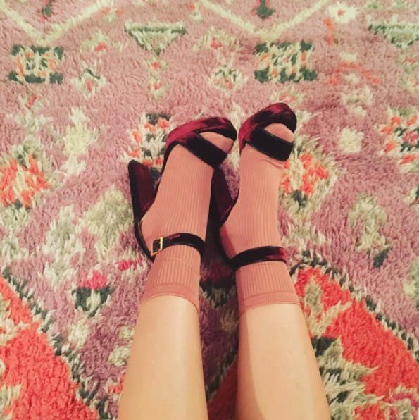 <p>Hilary proves that you can rock cute open-toe footwear and keep your peeps warm at the same time! She shared this snap of her feet in soft pink socks and burgundy-toned, ankle-strap heels in a velvety finish. <i> (Photo: Instagram) </i> </p>