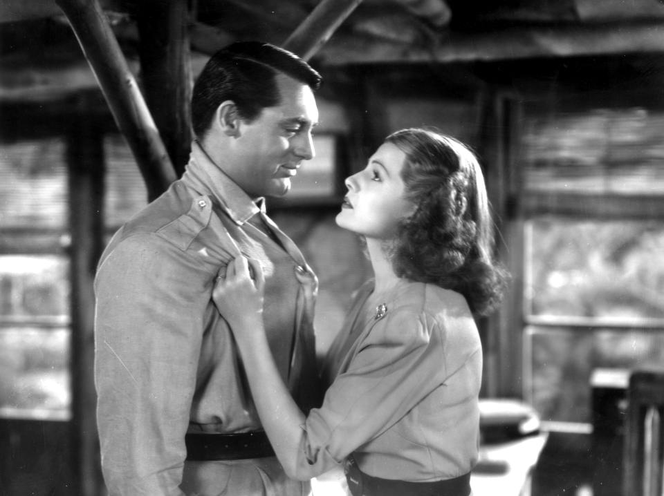 British-born actor Cary Grant (1904-1986) is propositioned by US actress Rita Hayworth (1918-1987) in a scene from the film 'Only Angels Have Wings' directed by Howard Hawks.   (Photo by Hulton Archive/Getty Images)