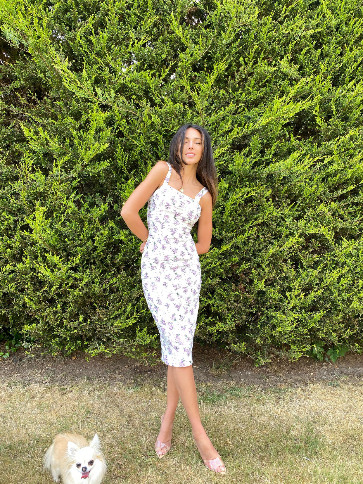 Michelle Keegan models the Ruched Stretch Bodycon Dress from her Very collection range in her garden.  (Very)