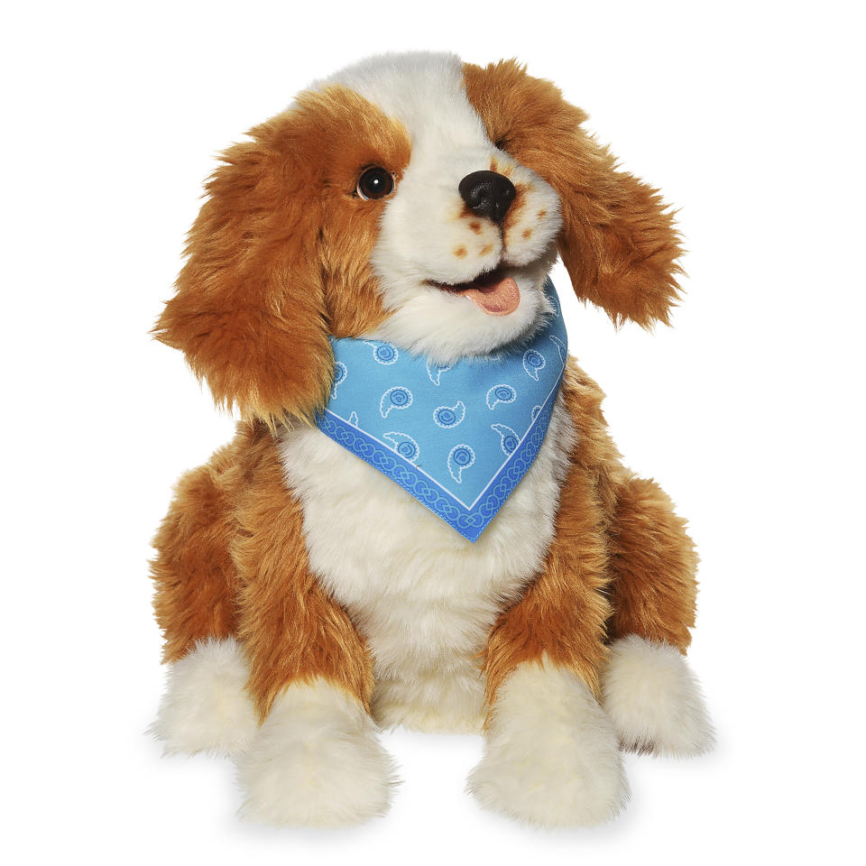 This image provided by Ageless Innovation shows the animatronic "Joy for All Companion Pet Pup" by Ageless Innovation. The plush toy has a heartbeat and built-in sensors that respond to motion and touch. Research is encouraging that such companion toys are beneficial to dementia patients. (Ageless Innovation via AP)