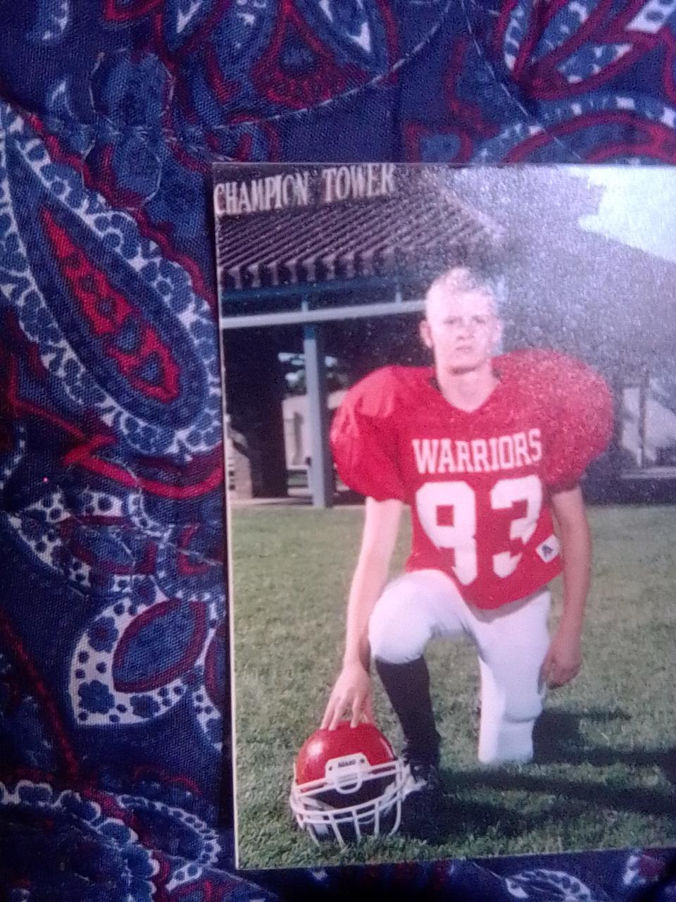 A photo shows Richard Ward in his high school football uniform.