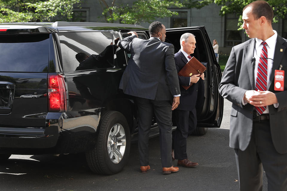 <span class="s1">Surrounded by security agents, Scott Pruitt, center, steps out of his armored SUV on Capitol Hill on April 26. (Photo: Chip Somodevilla/Getty Images).</span>