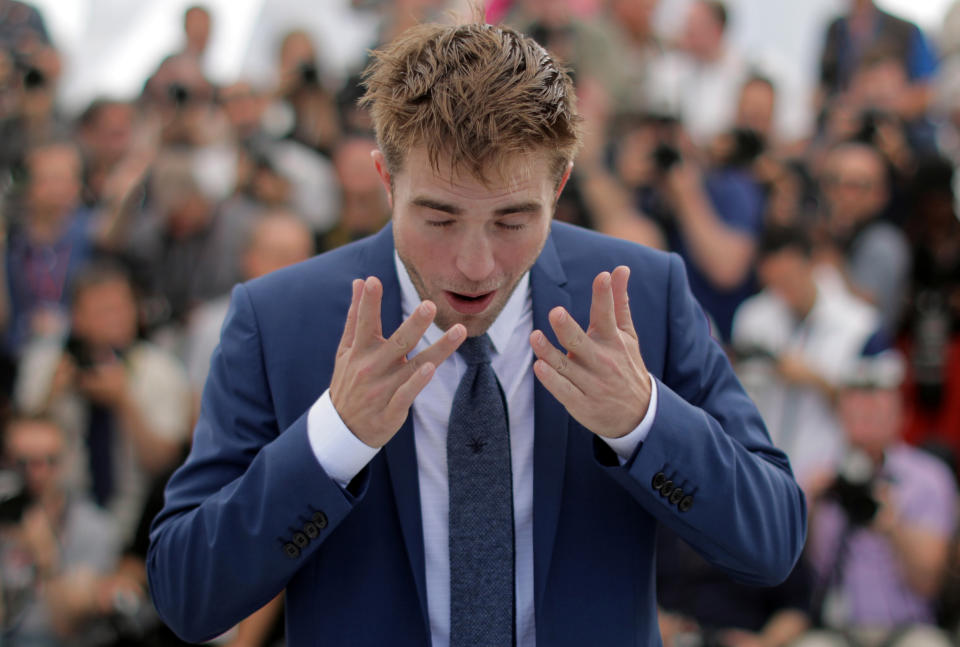 70th Cannes Film Festival - Photocall for the film "Good Time" in competition - Cannes, France. 25/05/2017. Cast member Robert Pattinson poses.   REUTERS/Eric Gaillard