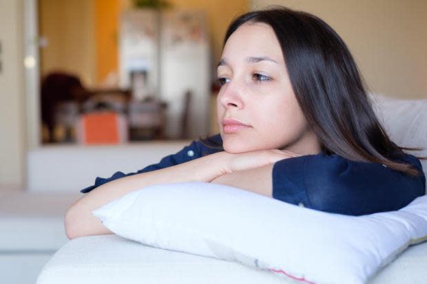 A woman deep in thought.