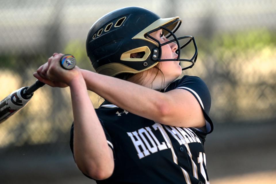 Holt's Eva Curtis gets on base against Lakewood in the sixth inning on Wednesday, May 26, 2021, during the Softball Classic semifinal at Ranney Park in Lansing. 