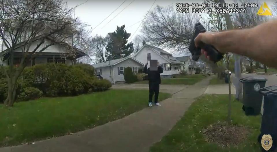 The video from Akron Police Officer Ryan Westlake's body came shows what happened when he tried to stop 15-year-old Tavion Koonce-Williams after a dog-walker reported that someone was pointing a gun at houses. In the first frame, as Westlake emerges from his police cruiser, he asks
Tavion, 