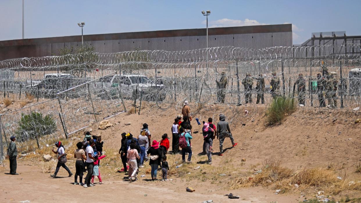  Migrants attempt to cross the U.S.-Mexico border in Ciudad Juarez, Mexico. 