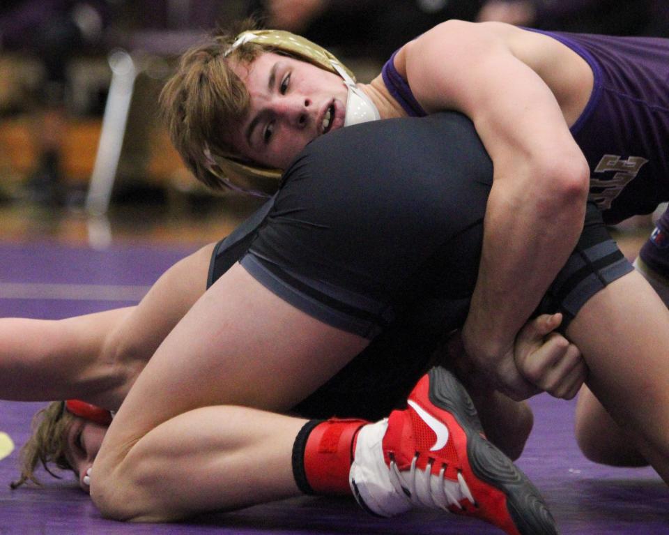 Dalton Daniel (top) is Fowlerville's highest-ranked wrestler, rated No. 9 at 126 pounds in Division 2 heading into the team state quarterfinals.