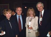 FILE - Former Soviet President Mikhail Gorbachev, second left, and his wife Raisa, left, Jane Fonda, second right, and Ted Turner pose during a reception at the State of the World Forum Wednesday, Sept. 27, 1995 at the Fairmont Hotel in San Francisco. The Forum will run through Sunday, Oct. 1, 1995. When Mikhail Gorbachev is buried Saturday at Moscow's Novodevichy Cemetery, he will once again be next to his wife, Raisa, with whom he shared the world stage in a visibly close and loving marriage that was unprecedented for a Soviet leader. Gorbachev's very public devotion to his family broke the stuffy mold of previous Soviet leaders, just as his openness to political reform did. (AP Photo/Susan Ragan, File)