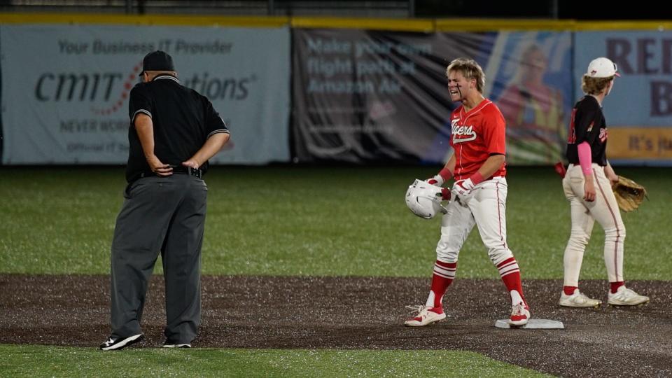 Beechwood's Landon Johnson celebrates after hitting a go-ahead two-run double in the seventh inning of the Tigers' 4-2 win over Dixie Heights on May 22, 2023.