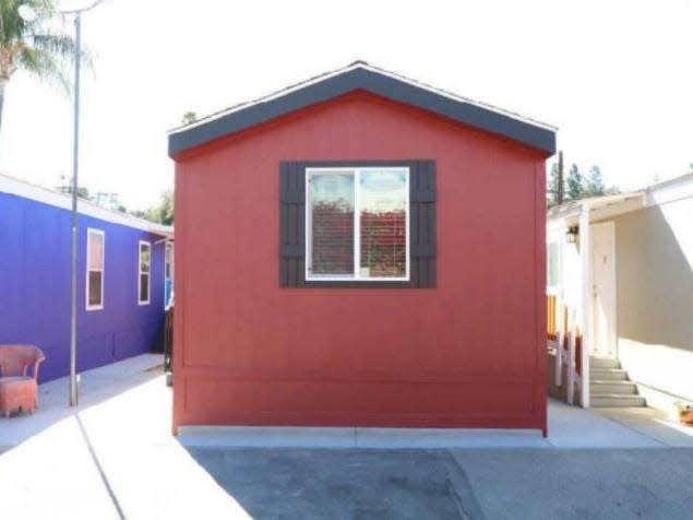 exterior shot of red mobile home in los angeles