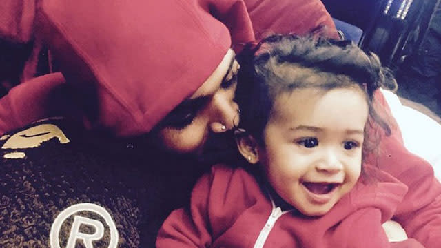 Chris Brown took to Instagram on Thursday to share some incredibly sweet photos of his young daughter Royalty. The first pic shows Brown and his 10-month-old little girl wearing matching red hoodies with the caption, "God has blessed me with my twin. #ROYALTY." He later posted a sweet, solo shot of his young daughter and captioned it simply with a heart. In March, it was reported that Brown had fathered a child with a 31-year-old former model named Nia, who Brown had reportedly known for years. The revelation of the news was cited by many as one of the reasons for Brown's tumultuous break-up with his on-and-off girlfriend, model Karrueche Tran, in March. <strong>VIDEO: Karrueche Tran Responds to Reports That Chris Brown Has a 9-Month-Old Daughter </strong> However, it seems that Brown is on the path of self-improvement. On Monday, Brown posted a photo of himself to Instagram with a lengthy message expressing his desire to "grow into a great man." "Every step I take will only be to greatness. Learning myself everyday and striving to make a difference," Brown wrote. "I can't make anyone love me or like me but for the people who do, you are highly appreciated and valued." These are the first photos Brown has posted of Royalty, and from the looks of it they won't be the last, as he strives to better himself. <strong>NEWS: Yes, Chris Brown Still Considers Himself a Role Model </strong> Last September, ET caught up with Brown to talk about his album <em>X</em>, and the rapper also got candid about his chequered past. Check out Brown's revealing interview in the video below.