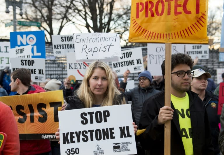 Opponents of the Keystone XL and Dakota Access pipelines hold a rally as they protest US President Donald Trump's executive orders advancing their construction