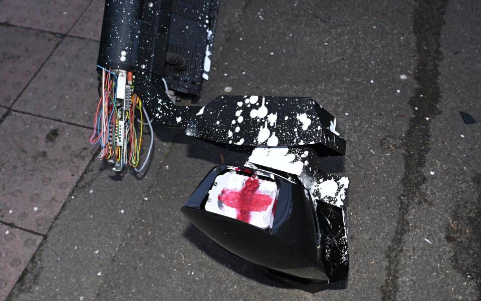 A Saint George's Cross appears to have been painted on the side of one of the vandlised cameras