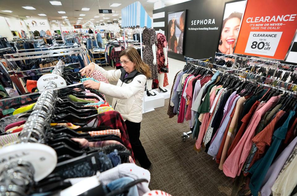 Debbie Ponczoch, of Wauwatosa, looks through a rack of clothes near the Sephora section at the Kohl's store on North 124th Street in Brookfield on Monday, Jan. 23, 2023.