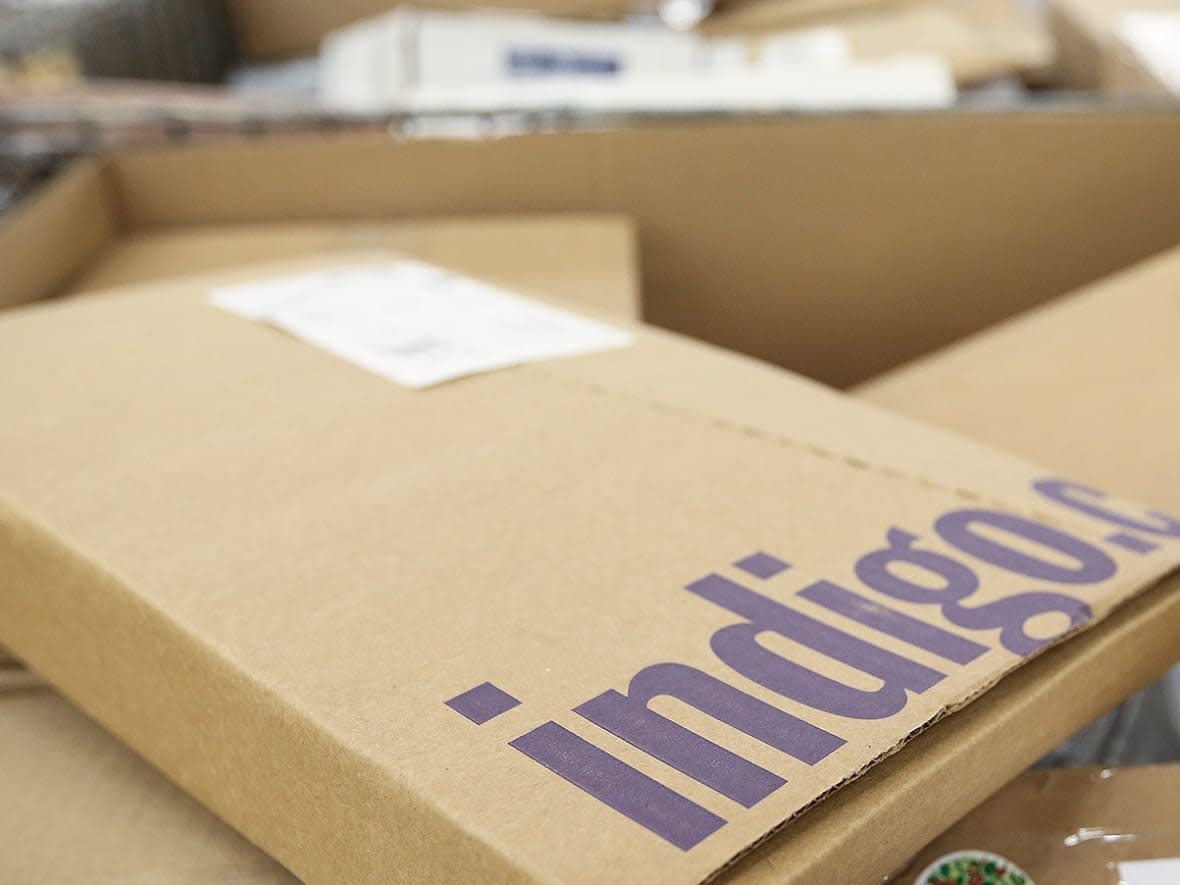 A package from Indigo's website is shown in a shipping-processing facility last December. The company has been hit by a cybersecurity incident that has made it impossible to make or complete any sales online for about a week. (Evan Mitsui/CBC - image credit)