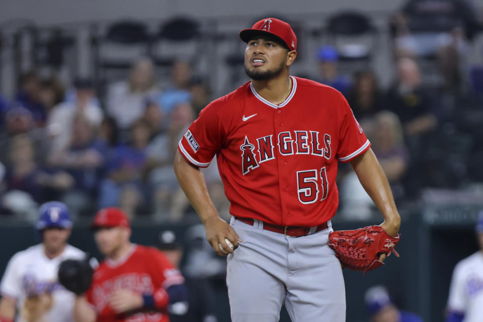 Los Angeles Angels starter Jaime Barria stands on the mound as he works against the Texas Rangers in the second inning of a baseball game, Tuesday, June 13, 2023, in Arlington, Texas. (AP Photo/Gareth Patterson)