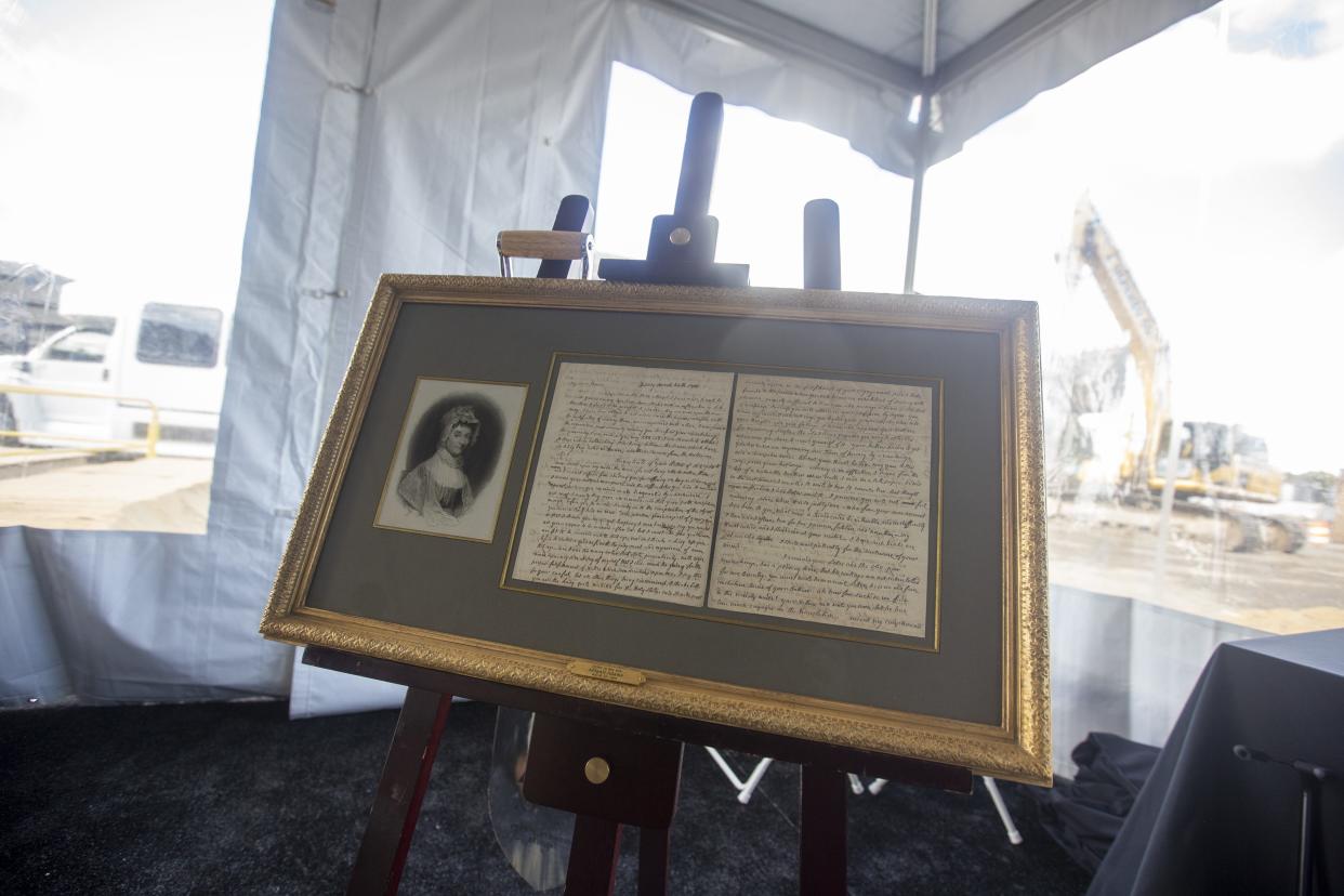 Toby Bozzuto, CEO and president of Bozzuto Group, presented Quincy with an original letter written by Abigail Adams in 1803 at a groundbreaking ceremony on Sept. 30, 2019, for a project his family company is building in the city.