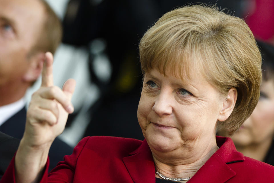 German Chancellor Angela Merkel reacts prior to a speech on a expert meeting about demography development in Germany's population in Berlin, Tuesday, April 24, 2012. German Chancellor Angela Merkel is defending her drive for European budget discipline, while her foreign minister says a Berlin-backed budget discipline pact must remain in place despite new political uncertainty. (AP Photo/Markus Schreiber)