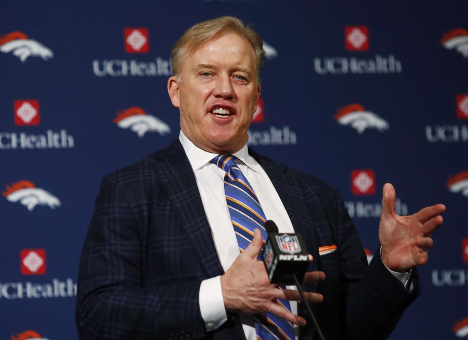 FILE- In this Jan. 12, 2017, file photo, Denver Broncos general manager John Elway responds to questions during a news conference at the team's headquarters in Englewood, Colo. The NFL is considering making referees full-time employees and centralizing replay review at its New York headquarters as it aims for more consistent, shorter games, Tuesday, Feb. 28, 2017. The NFL is considering making referees full-time employees and centralizing replay review at its New York headquarters as it aims for more consistent, shorter games, Tuesday, Feb. 28, 2017. Elway, a member of the competition committee, said the caveat is that these referees have successful careers outside of football and they may not want to give up their day jobs. (AP Photo/David Zalubowski, File)