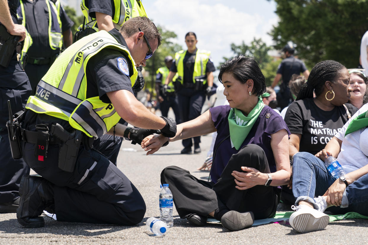 Rep. Judy Chu, D-Calif., is arrested by Capitol Police with over a hundred people during an act of civil disobedience during a protest for abortion-rights on June 30, 2022, in Washington. (Jacquelyn Martin / AP)