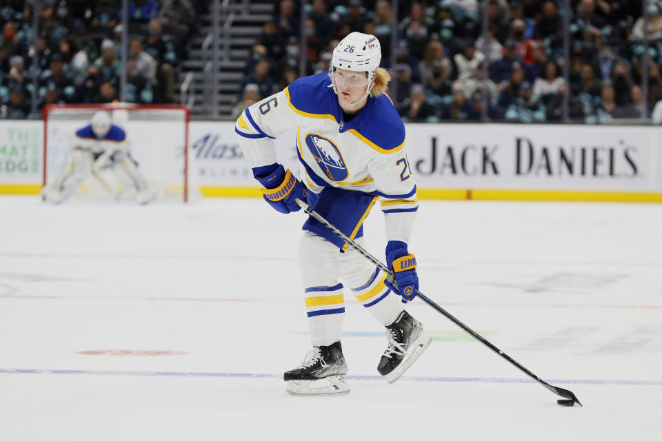 Rasmus Dahlin #26 of the Buffalo Sabres in action against the Seattle Kraken 