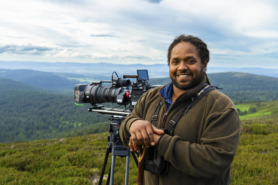 Hamza: Strictly Birds of Prey (w/t),Hamza Yassin,Wildlife cameraman Hamza Yassin stands with his camera in the Cairngorms National Park,Ellie Jo Hilton/Silverback Films,Ellie Jo Hilton