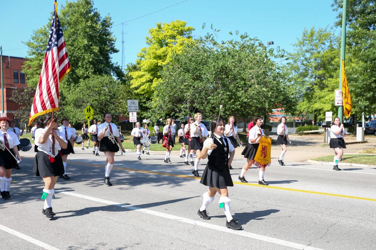 The Central High School Kiltie Drum & Bugle Corps marches down North Benton Avenue during the annual Old-Fashioned 4th of July Parade in the Midtown Historic District Monday, July 4.