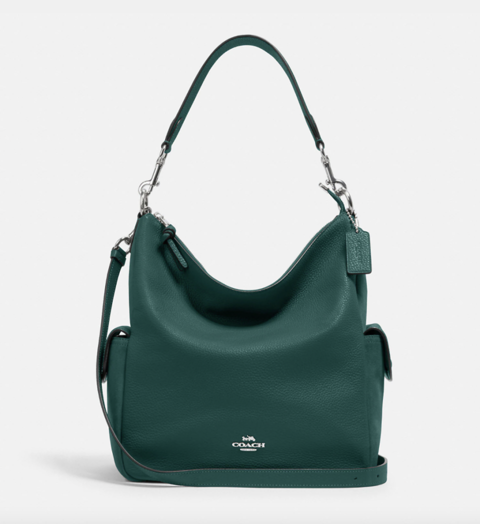 Pennie Shoulder Bag in dark green leather (Photo via Coach Outlet)