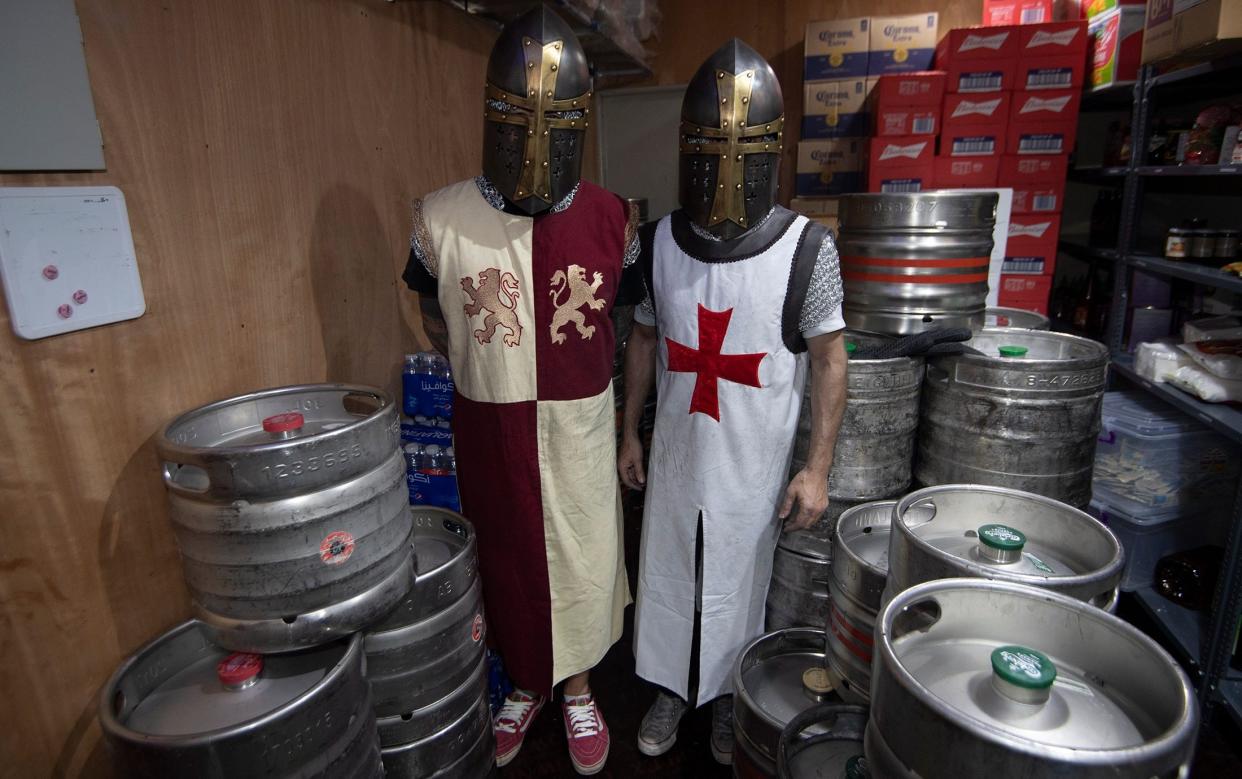 Exclusive: England fans in knight fancy dress accused of being 'Muslim killers' by Qatari police - Eddie Mulholland for The Telegraph