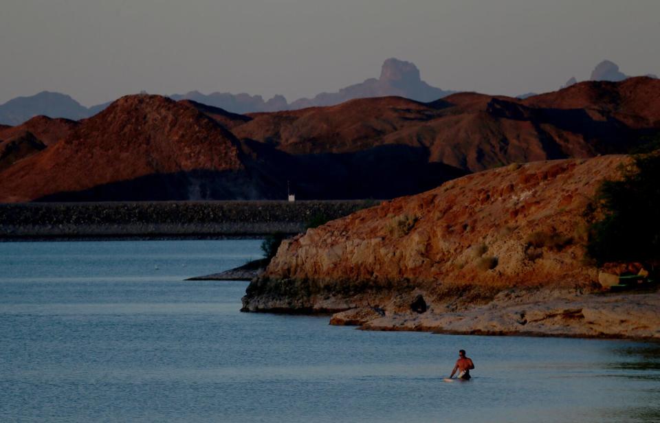 Campers find a secluded spot on the shore of Lake Martinez