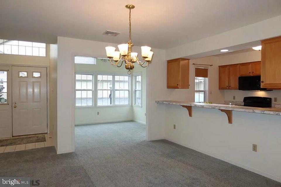 A view of the entrance, living room and kitchen at 122 Wellington Drive in State College. Photo shared with permission from home’s listing agent, Beth Richards of Beth Richards | Sandy Stover Group.