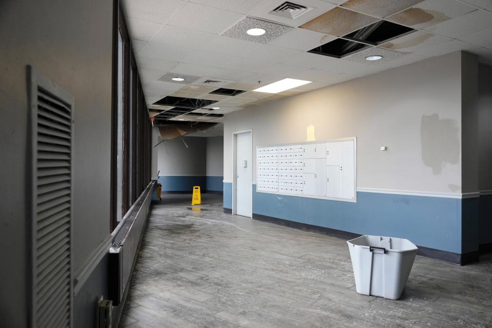 Ceiling tiles are seen falling out Thursday in the lobby of the Latitude Five25 apartment complex, 525 Sawyer Blvd., on Columbus's Near East Side.