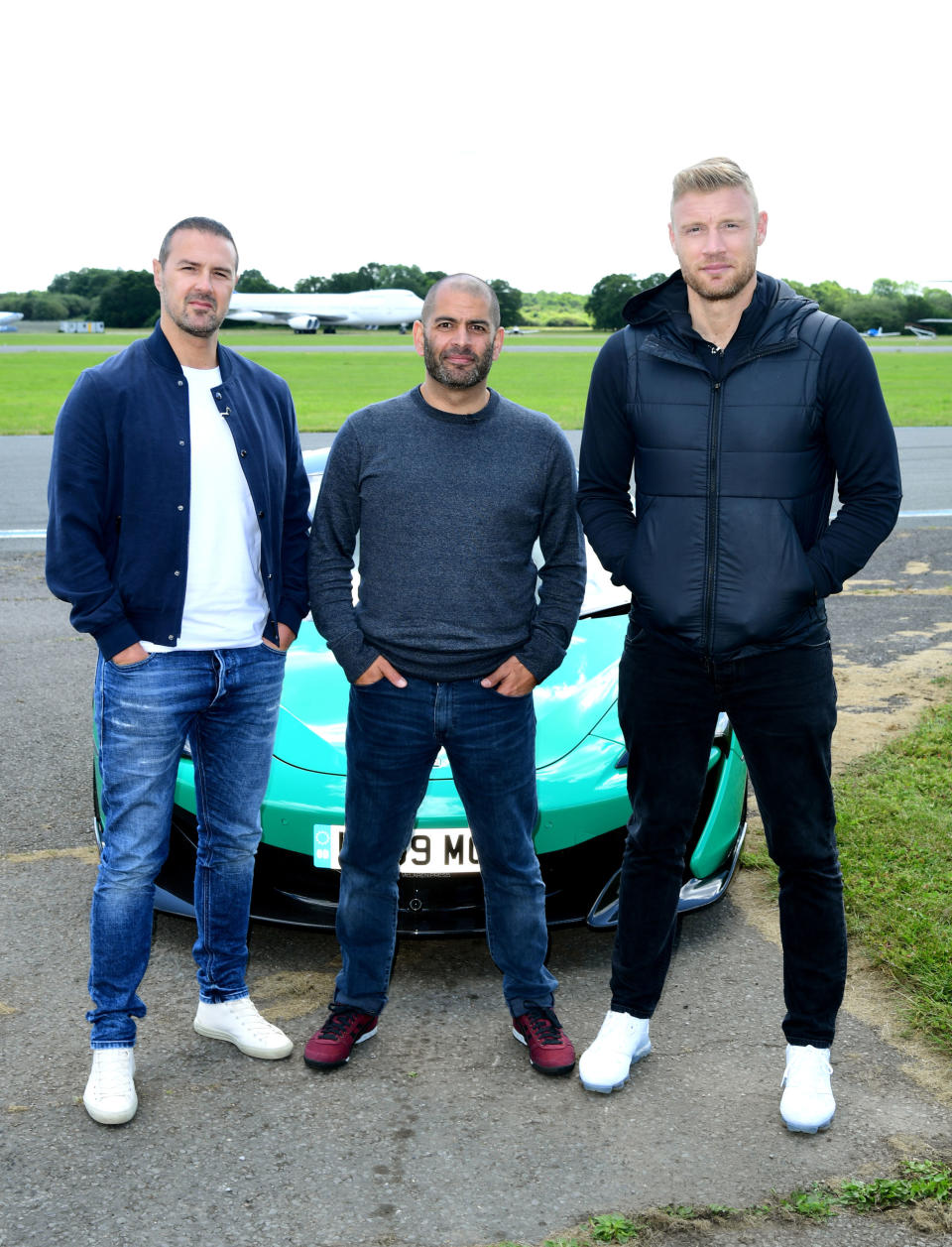 Paddy McGuinness, Chris Harris and Freddie Flintoff with a McLaren 600LT on the Top Gear test track in Dunsfold Park, Cranleigh, during the media launch for the new series of Top Gear which airs later this month.