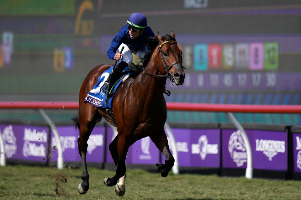 Irad Ortiz Jr. rides Golden Pal to victory during the Breeders' Cup Turf Sprint race at the Del Mar racetrack in Del Mar, Calif., Saturday, Nov. 6, 2021. (AP Photo/Jae C. Hong)