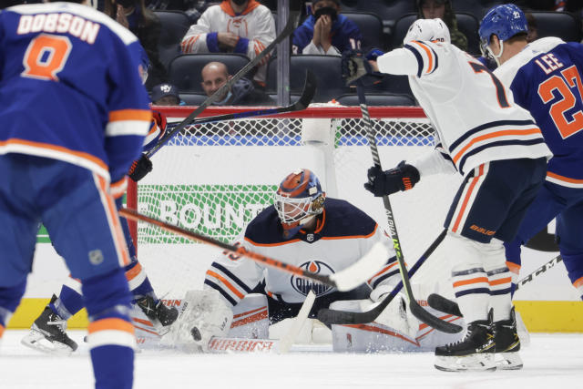 Dobson scores in OT to give Islanders 3-2 win over Oilers