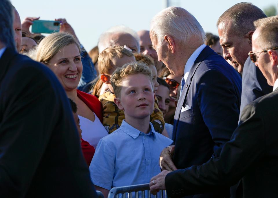 President Joe Biden greets guests as he arrives at Vilnius airport ahead of a NATO summit in Vilnius, Lithuania, Monday, July 10, 2023. (AP)