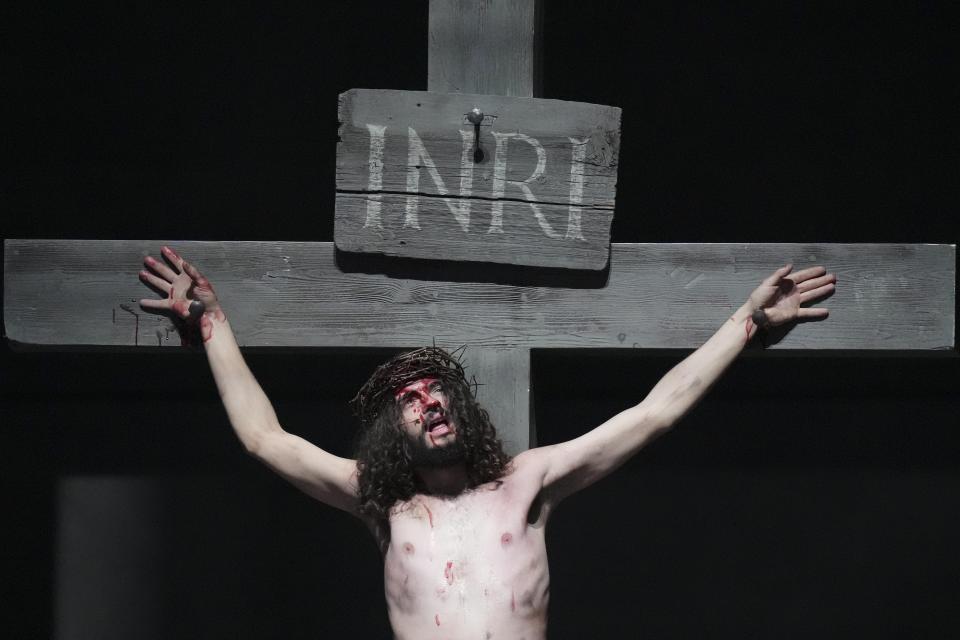 Rochus Rueckel as Jesus performs during the rehearsal of the 42nd Passion Play in Oberammergau, Germany, Wednesday, May 4, 2022. (AP Photo/Matthias Schrader)