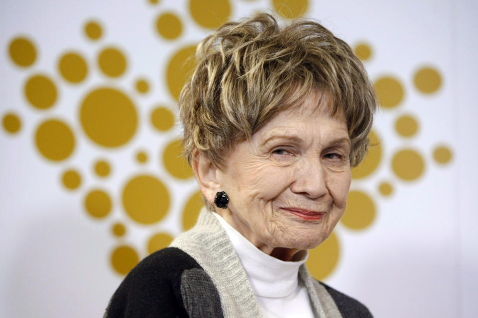 FILE - Nobel Prize-winning Canadian author Alice Munro attends a ceremony held by the Royal Canadian Mint where they unveiled a 99.99% pure silver five-dollar coin in Victoria, B.C., on March 24, 2014. Munro, the Canadian literary giant who became one of the world’s most esteemed contemporary authors and one of history's most honored short story writers, has died at age 92. (Chad Hipolito/The Canadian Press via AP, File)