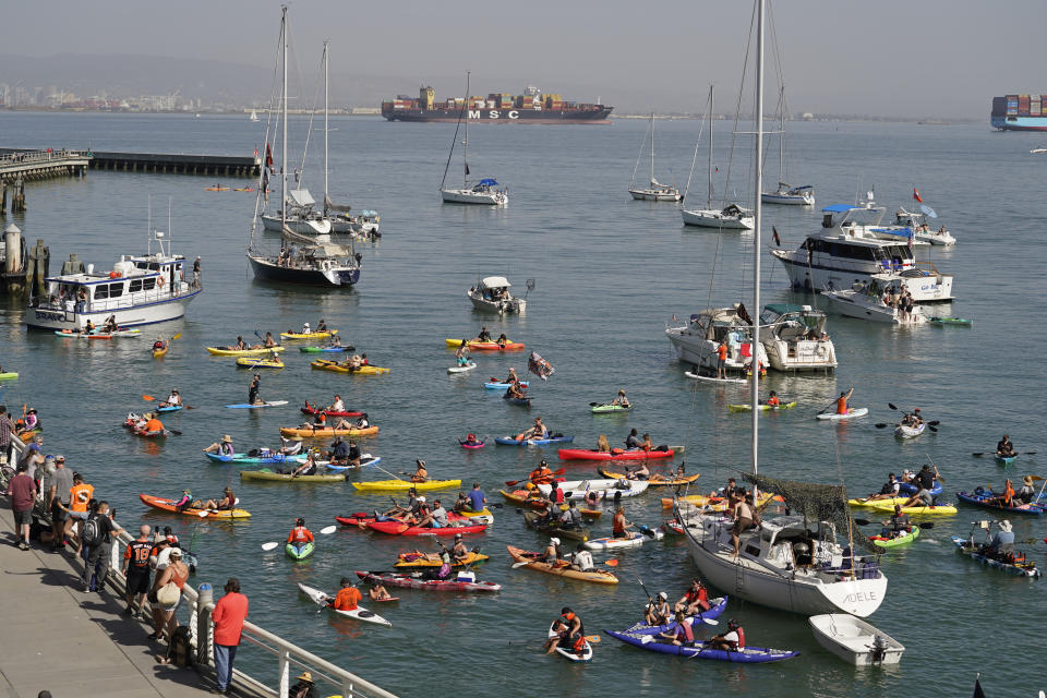 Boats fill McCovey Cove outside Oracle Park during the eighth inning of a baseball game between the San Francisco Giants and the San Diego Padres Sunday, Sept. 27, 2020, in San Francisco. (AP Photo/Eric Risberg)