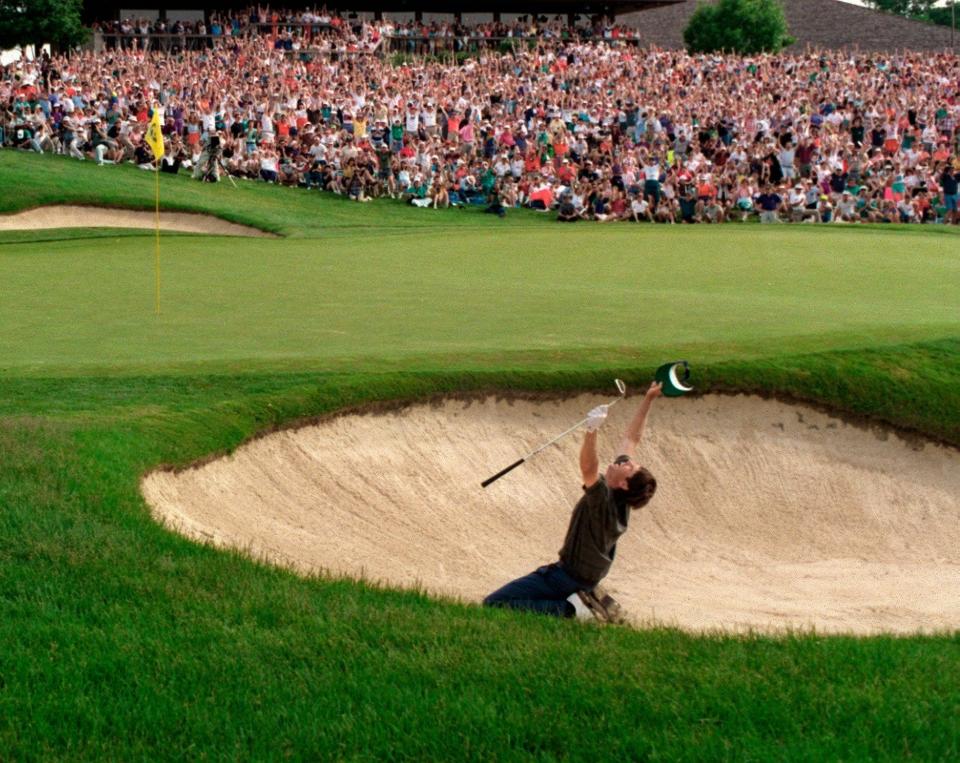 Paul Azinger celebrates his winning shot at the Memorial Tournament in 1993.<br>Azinger