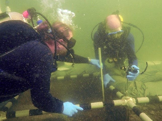 Archaeologists work the Manasota Key Offshore archaeological site that includes a prehistoric burial site from the Florida Archaic period, a time when bodies of people who had died were interred within a pond. [COURTESY PHOTO]