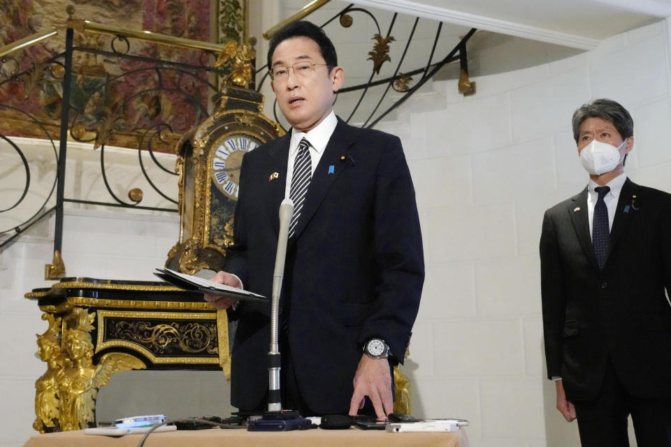 Japan's Prime Minister Fumio Kishida, center, speaks to reporters after North Korea fired a ballistic missile amid rising animosities, during his visit to Rome, Italy, Wednesday, May 4, 2022 . “North Korea’s series of actions that threatens the peace, safety and stability of the international community are impermissible,” Kishida told reporters during his visit to Rome. (Sadayuki Goto/Kyodo News via AP)