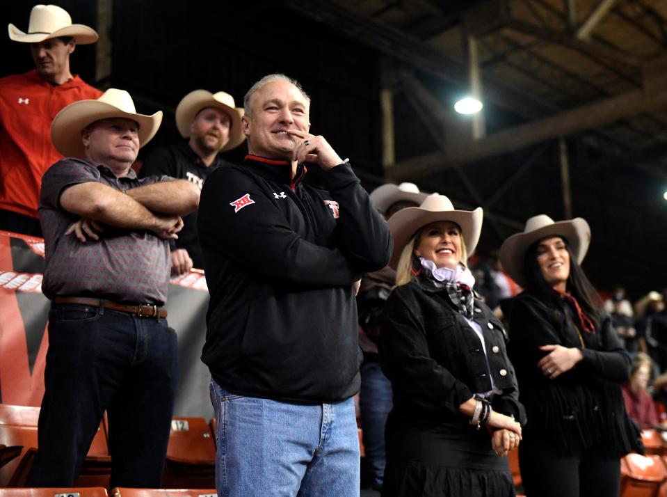 Texas Tech coach Joey McGuire watches his players compete in the Rodeo Bowl on Monday night at NRG Arena. Behind McGuire to his left are Tech assistant coaches Zach Kittley, Kenny Perry and Stephen Hamby.