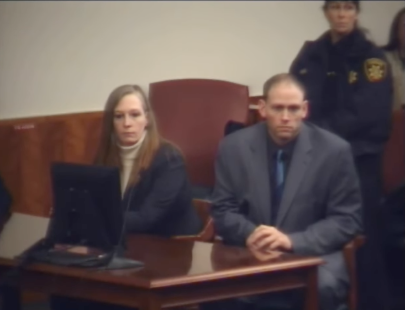 Stacey receiving the verdict in court