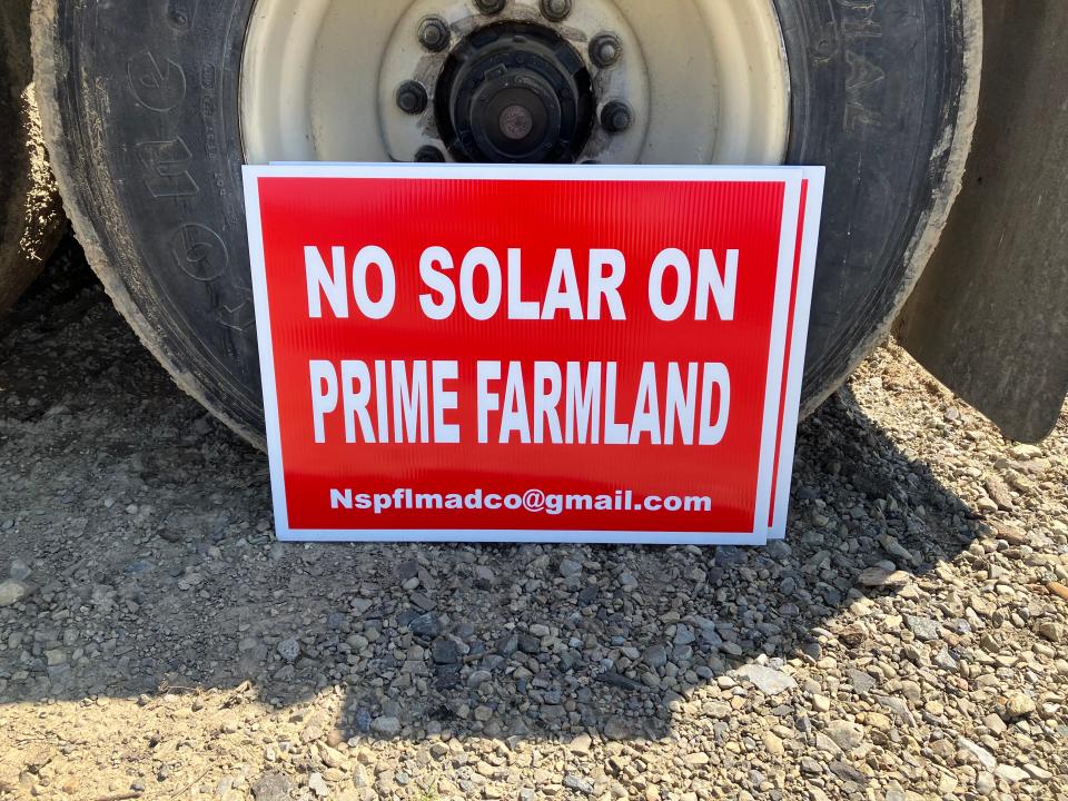 Madison County residents who oppose solar power development had these signs printed.