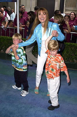 Jane Seymour wrangling children at the Los Angeles premiere of Disney's Atlantis: The Lost Empire